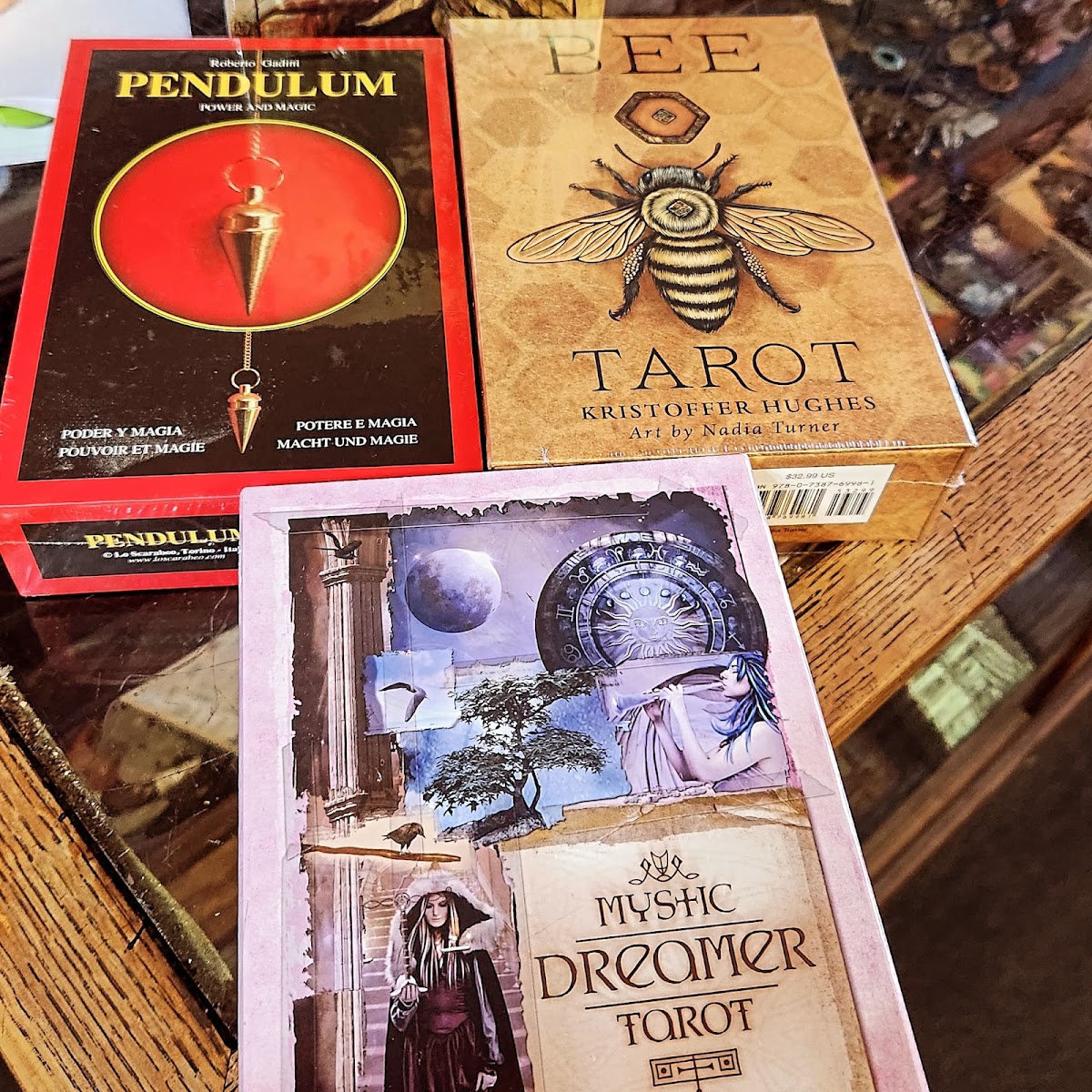 Tarot and oracle decks on a shelf at Soul Seeker